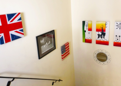 Art and decor hung in stairwell