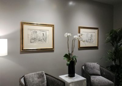 Secured Picasso lithographs on lobby wall