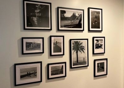 Gallery wall of photos in Hermosa Beach home